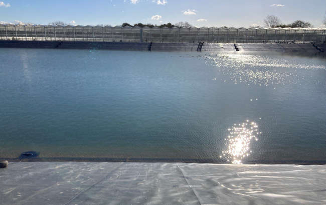 Reservoir of water with sun shining