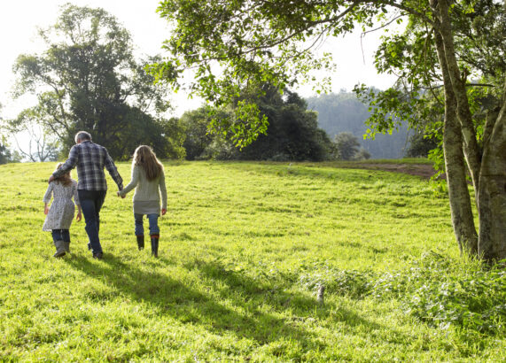 A family walking in the countryside
